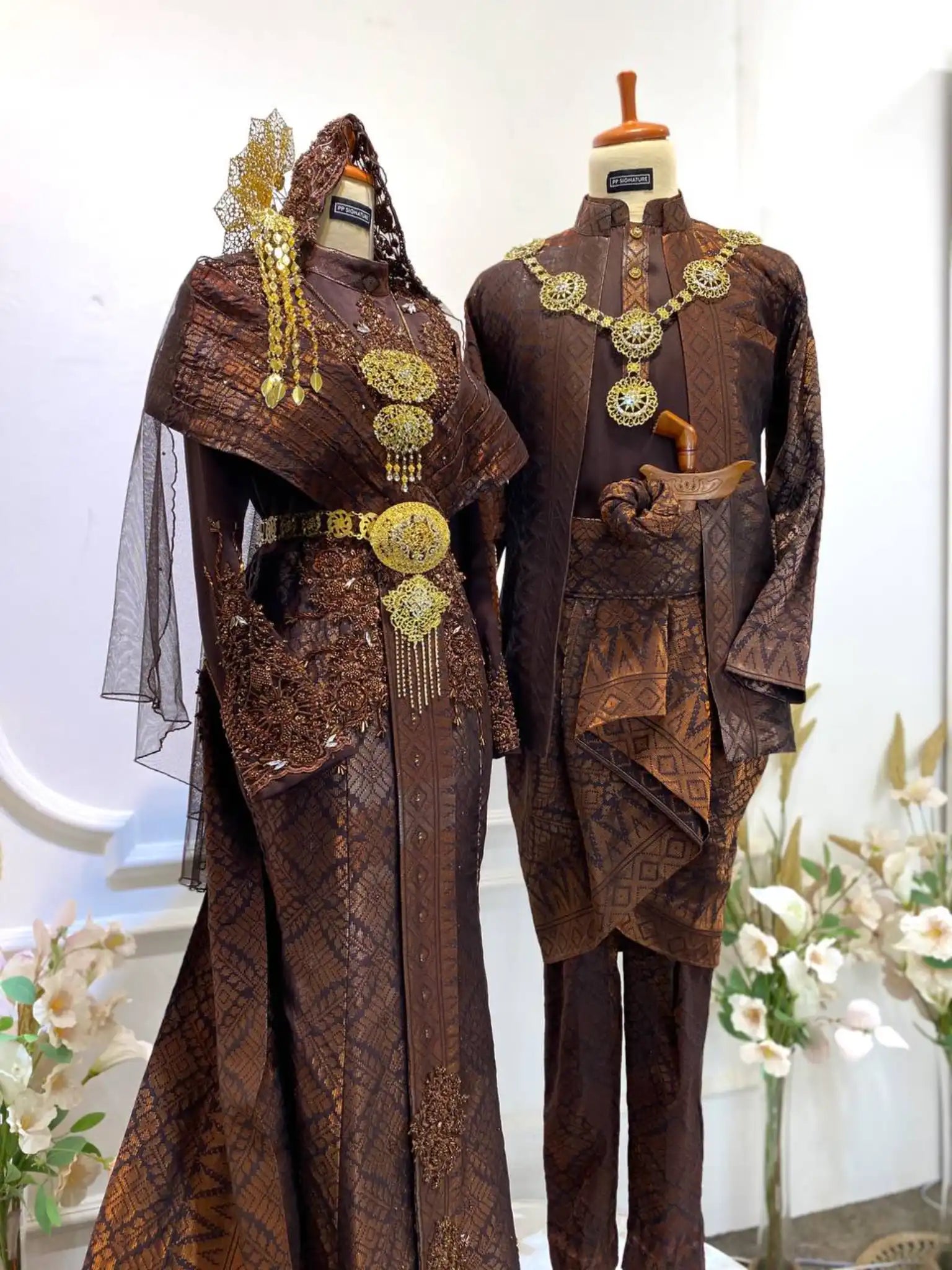 Elegant Wedding Dress with Trail-Rent Malay Songket for Weddings-Unique Bridal Songket in Dark Brown-CIK SITI WAN KEMBANG Kebaya Moden-Traditional Songket for Brides and Grooms