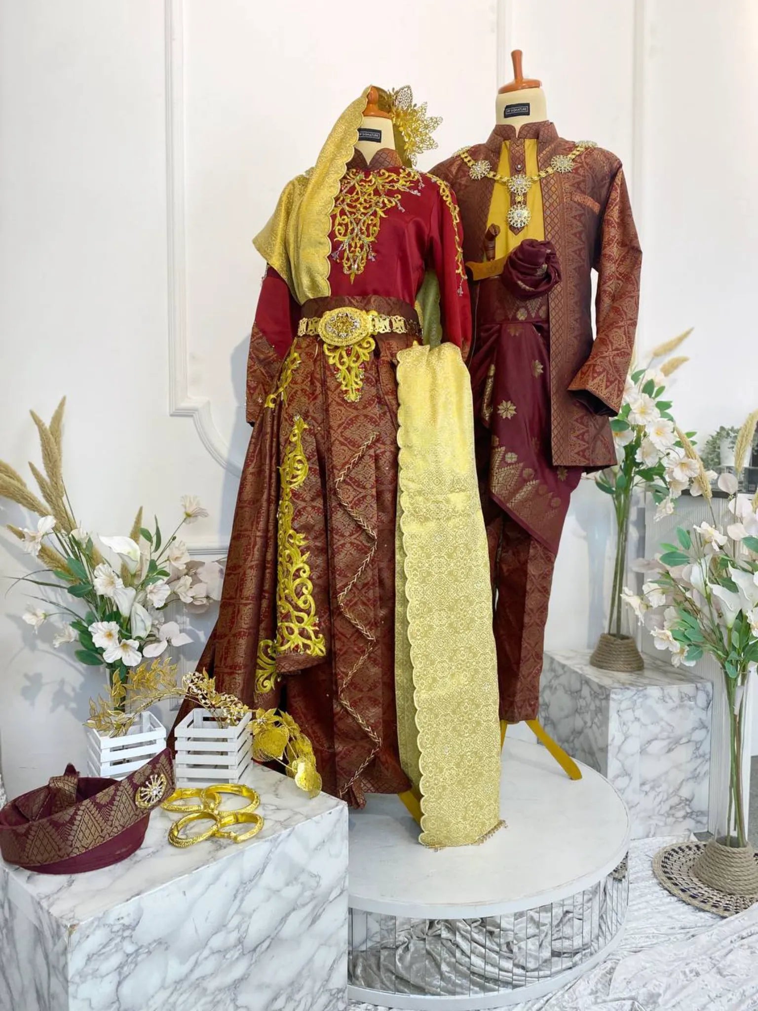 Mahawangsa – A Regal Malay Wedding Look in Maroon & Gold