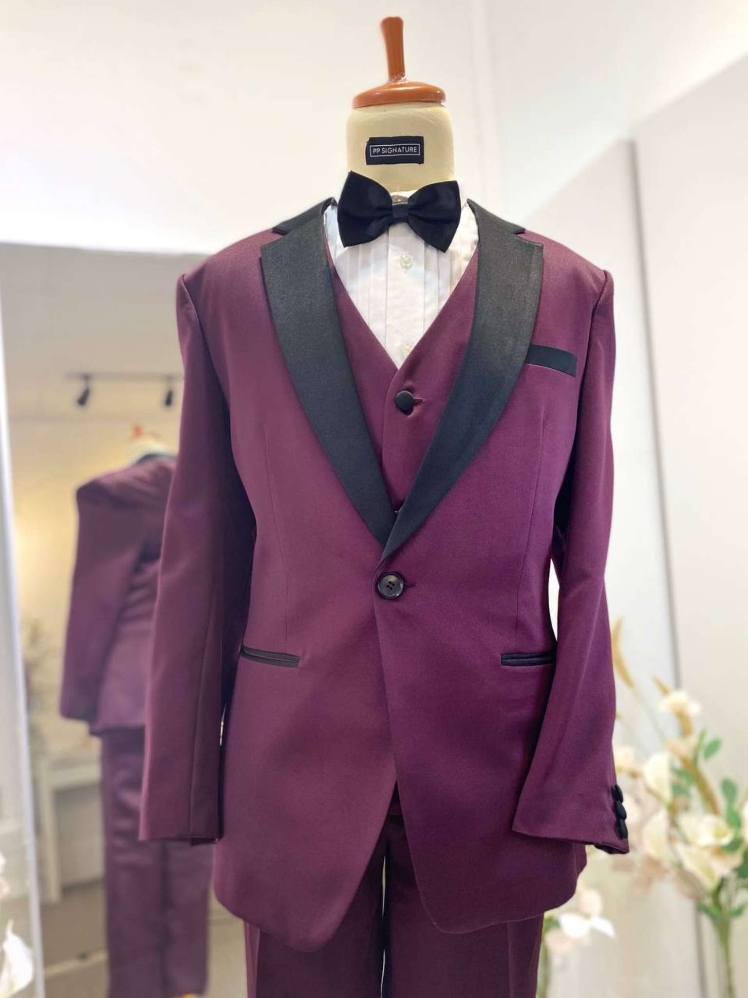 Purple tuxedo rental-Three-piece tuxedo-Tuxedo with black notch lapel-Formal event tuxedo-Wedding tuxedo-Tuxedo for grooms-Stylish wedding suit-Elegant tuxedo rental-High-quality tuxedo-Tuxedo rental online